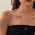 Collana a doppio strato con micro perle dorate da donna dal design minimalista - Oro