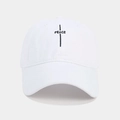 Detail of black PEACE embroidery and texture on a white cotton baseball cap - White