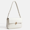 Minimalist white leather flap shoulder bag with a gold metal chain lock and strap - Ivory
