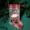 Red and grey Christmas stocking featuring 3D Santa and snowflake patterns on green pine - Santa Claus