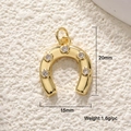 Detail view of 20x15mm horseshoe pendant in gold plating with sparkling zircon stones - Multi-Stone Gold Horseshoe