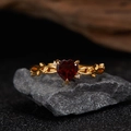 S925 silver gold plated ring with heart-shaped garnet and leaf design on grey rock - Natural Garnet Leaf Heart Ring LR355