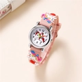 Kids quartz watch with pink unicorn silicone strap and rainbow pattern on beige background - Pink