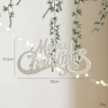Cream Merry Christmas sign with glitter hanging on green festive pine branches - Sequined Letter Sign / White