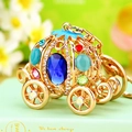 Sparkling crystal pumpkin carriage keychain with gold metal plating and colorful gemstones - Cinderella Pumpkin Carriage Royal Blue