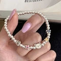 Silver beaded bracelet with colorful floral charms and cute bear head pendant on hand - Bear Multi-color Floral (SL1353)