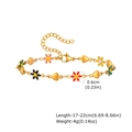 Detail of colorful enamel hearts and flowers on a gold-plated stainless steel bracelet - Enamel Heart and Flower