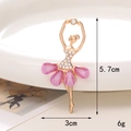 Detail view of a gold ballet dancer brooch with purple stones and size 5.7x3cm markings - D543 Resin Girl (Gold Purple)