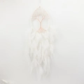 Macro detail of hand-woven copper tree of life design on a white dream catcher charm - White + White Water Drop
