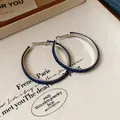 Minimalist dark blue denim hoop earrings with white stitching and silver metal finish - 925 Silver Needle / Blue