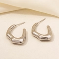 Close-up of silver 304 stainless steel C-shaped earrings with irregular wavy texture - Wave Texture Irregular C-Shaped Style (D211-S)