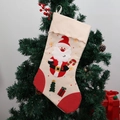 Calza di Natale con applique Babbo Natale e ricamo a fiocco sulla pianta - Calza con Babbo Natale