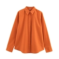 Close-up of bright orange linen shirt collar with S-size label on a white background - XS / Orange Top