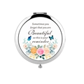 Silver portable makeup mirror with floral print and inspirational quote on white background - Beautiful Reminder Text