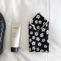 Detailed close-up of dark blue linen small square scarf with white floral patterns - Small Flower Navy