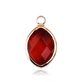 Detail of a red marquise-cut glass pendant in a gold metal frame with a top loop - Gold - January