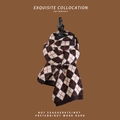 Classic brown and beige argyle knit scarf displayed on a mannequin for winter warmth - Thick Argyle Knit Coffee