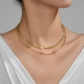 Gold double-layered necklace featuring a herringbone snake chain and delicate bead accents - Gold Layered Snake & Bead Chain