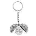 Detail of opening silver sunflower keychain with engraved Keep fucking Going message - T00005 Full Silver (Keep fucking going)