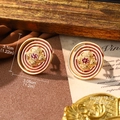 Detailed macro view of vintage red enamel spiral earrings with dimensions and weight info - Red Spiral Disk Style