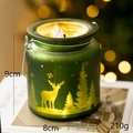 Grüner mattierter Weihnachts-Glaskerzenhalter mit goldenen Rentiersilhouetten und Griff - Groß / Grün