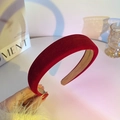 Plush dark red velvet wide sponge headband with anti-slip lining held by hand - Velvet / Elegant Red