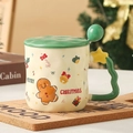 Christmas gingerbread man ceramic mug with a green lid and star-decorated handle - Gingerbread Man - Mug with Lid & Spoon