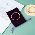 Frosted gold bracelet with purple velvet drawstring jewelry storage pouch on mint background - Drawstring Style - Purple; 5*9cm Velvet Bag