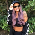 Women's long wavy purple hair wig with black hoodie cap and sunglasses outdoor - Purple