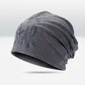 Dark grey knitted beanie cap featuring a star print design in casual streetwear style - STAR Style / Dark Gray