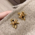 Pendientes de ojo de tigre chapados en oro de 18K con diseño de fuegos artificiales - Versión de Gama Alta de Cobre Bañado en Oro (Pin de Plata)
