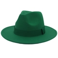 Macro shot of British style emerald green wool felt fedora with matching grosgrain ribbon band - Grass Green