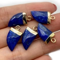 Five blue lapis lazuli chili pendants with gold plated caps held in hand - 10x20mm / Lapis Lazuli