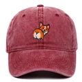 Close-up of embroidered Corgi dog pattern on vintage washed burgundy baseball cap - Burgundy