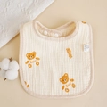 U-shaped beige cotton muslin baby bib with cartoon bear prints and snap closures - Baby Bear