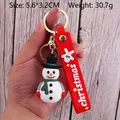 Christmas snowman keychain with white PVC rubber, green scarf, and red silicone wrist strap - Christmas Snowman-12