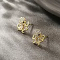 Golden octopus stud earrings with white cubic zirconia and black gemstone accents - Octopus Shape (001)
