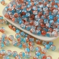 Detailed macro shot of 10mm blue and orange cracked glass beads for DIY jewelry making - 10mm / Sangjiu (Blue and Orange)