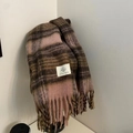 Detail of soft plaid scarf with tassels in brown and pink tones for winter warmth - British Plaid Pink