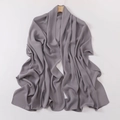 Detail showing the soft drape and silky texture of this premium grey rectangular headscarf - Gray