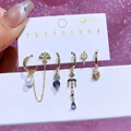 6-piece gold earring set with purple heart stones and pearls on display card - French Vintage Series (3104)