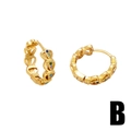 Minimalist gold heart hoop earrings with colorful zircon stones on a white background - Heart-Shaped Hollow Design (B)