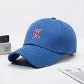 Navy blue cotton baseball cap with red 3D embroidered letter K on a minimalist background - Adjustable / Blue