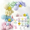 Pastel macaron balloon arch kit with pink blue yellow green purple and gold star accents - Macaron Set 01