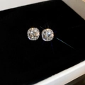 Macro shot of silver vintage earrings with sparkling central gemstone in a black jewelry box - Silver Paved Square Style (S925 Silver Pin)