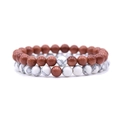 Macro detail of elastic bead bracelets with brown goldstone and white turquoise stones - Goldstone + White Vein Turquoise