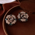 Macro shot of vintage green enamel flower earrings with crystals in a brown velvet box - 17# Antique Gold Rhinestone Flower