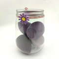 Barattolo di morbide spugne per trucco viola con tappo argento e ciondolo a margherita - Set Viola (4 Pezzi)