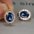 Elegant rose gold earrings featuring blue oval gemstone and white zircon accents - Rose Gold Blue Rhinestone
