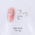 Macro view of moon-shaped nail art alloy with crystal rhinestones sized 7x8.5mm - Silver Aurora Zircon Moon Style (8254)
